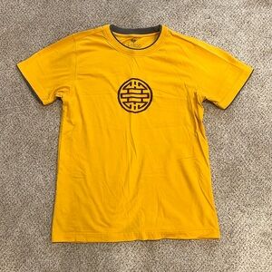 Yellow tshirt with embroidered design